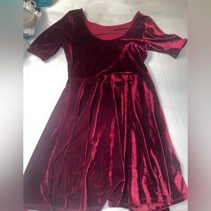 Red velvet sleeved dress